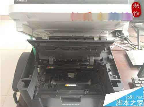 打印机怎么将墨盒取出来加粉?