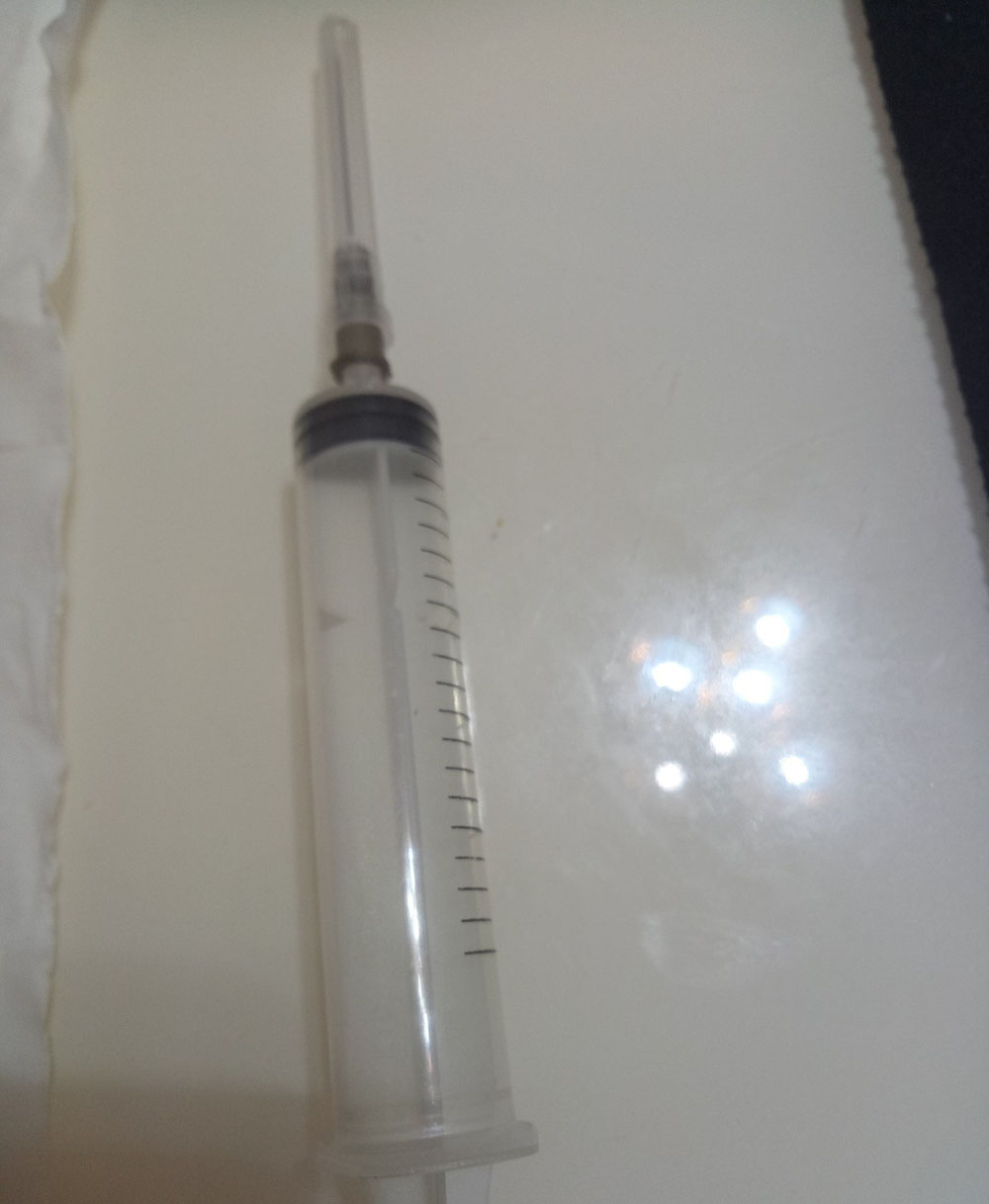佳能MX922打印机怎么把原装墨盒改成连供墨盒?