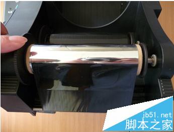 北洋条码2100e打印机怎么自己更换色带?