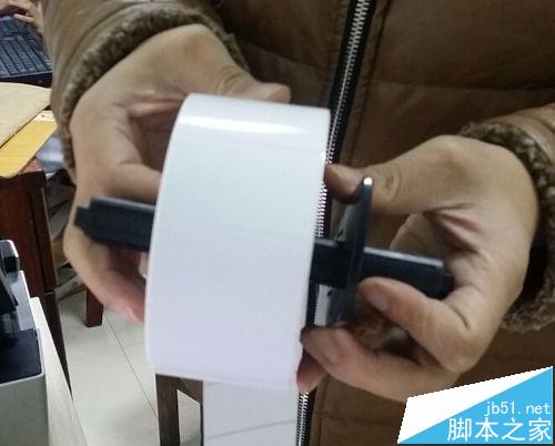北洋条码打印机2100e怎么更换纸卷?