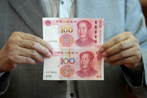 新版100元人民币如何辨真伪 七招教你快速辨别新版100元人民币真伪